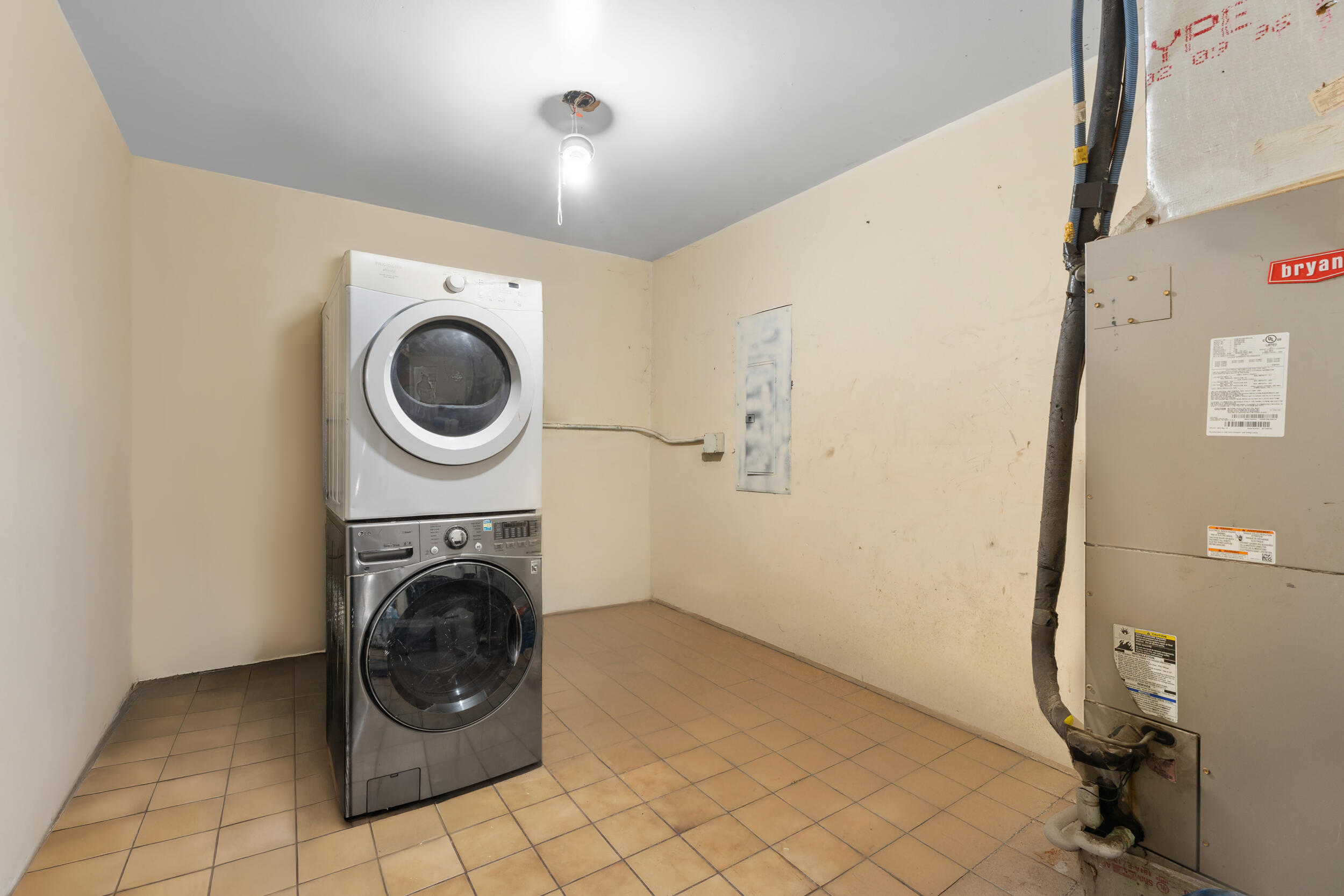 1449 West 35th Street Riviera Beach, FL 33404 - Photo 20 of 28 a utility room with dryer and washer