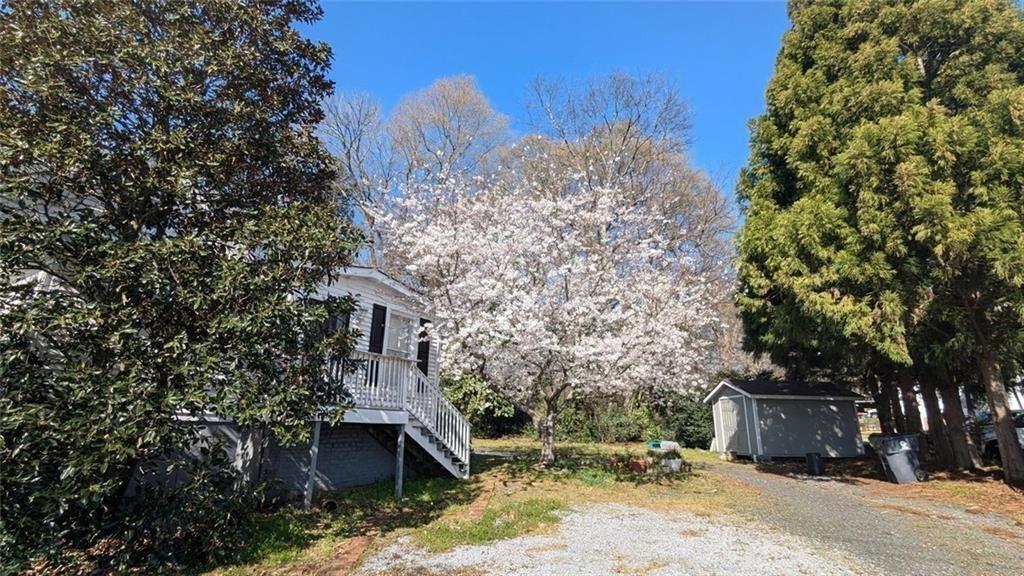 300 Church Street Rockmart, GA 30153 - Photo 15 of 63 a view of a house with a yard