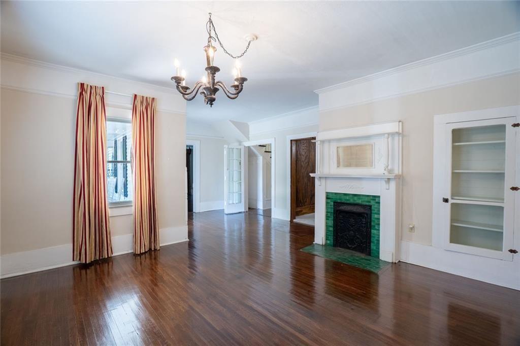 300 Church Street Rockmart, GA 30153 - Photo 21 of 63 a view of a livingroom with wooden floor and a fireplace