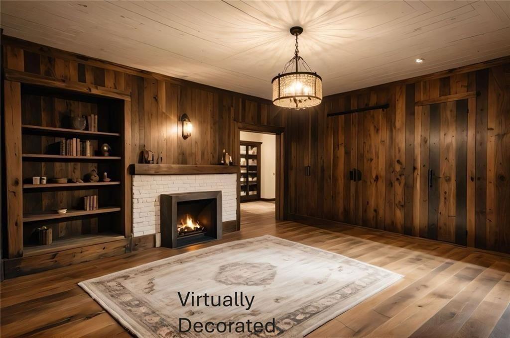 300 Church Street Rockmart, GA 30153 - Photo 29 of 63 a view of an empty room with wooden floor fireplace and a window
