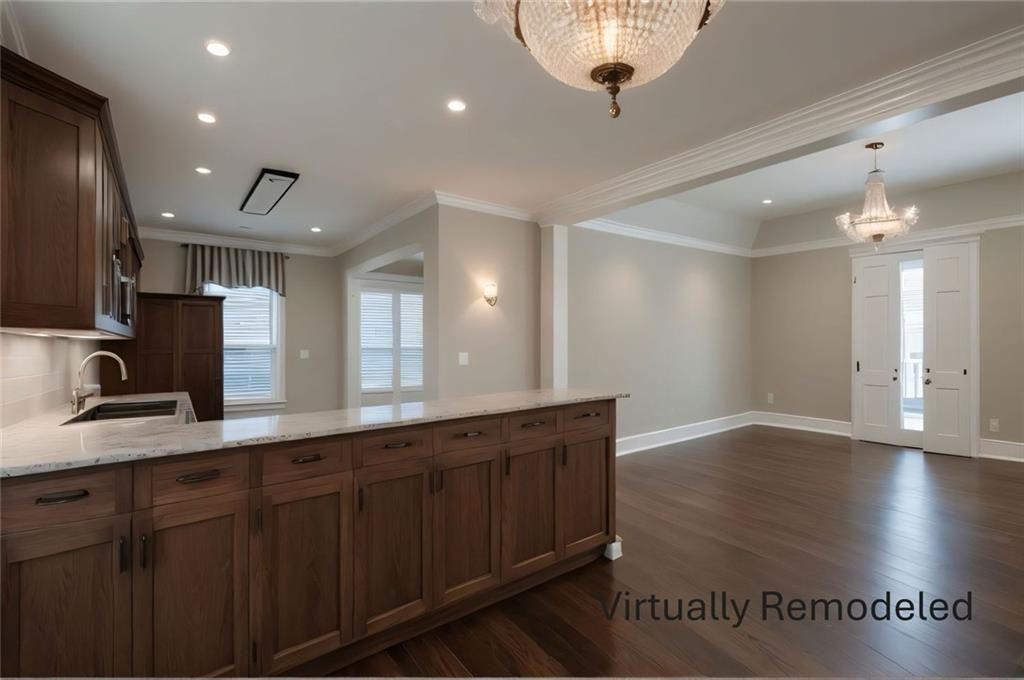 300 Church Street Rockmart, GA 30153 - Photo 34 of 63 a view of a kitchen island wooden floor and staircase