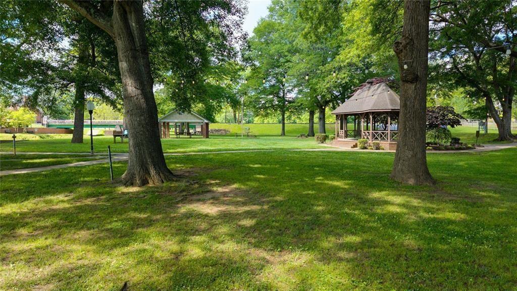 300 Church Street Rockmart, GA 30153 - Photo 59 of 63 a view of a house with a big yard and large trees