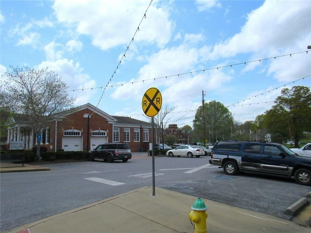 300 Church Street Rockmart, GA 30153 - Photo 8 of 63 a view of street with parked cars