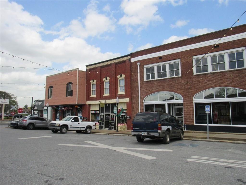 300 Church Street Rockmart, GA 30153 - Photo 9 of 63 a car parked in front of a building