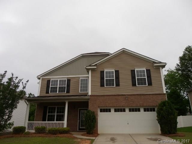 1124 Spicewood Pines Road Fort Mill, SC 29708 - Photo 1 of 16 a front view of residential houses