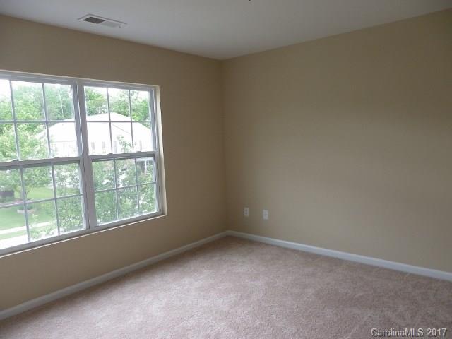 1124 Spicewood Pines Road Fort Mill, SC 29708 - Photo 12 of 16 an empty room with a window
