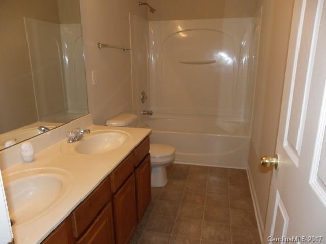 1124 Spicewood Pines Road Fort Mill, SC 29708 - Photo 13 of 16 a bathroom with a sink a toilet and shower