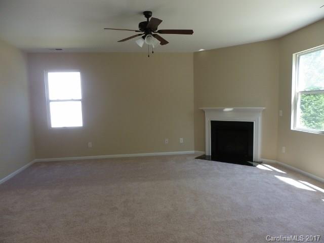 1124 Spicewood Pines Road Fort Mill, SC 29708 - Photo 4 of 16 a view of an empty room with a window