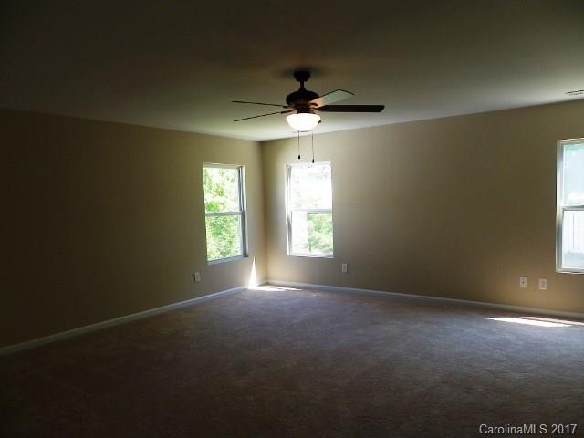 1124 Spicewood Pines Road Fort Mill, SC 29708 - Photo 6 of 16 a view of an empty room with a window