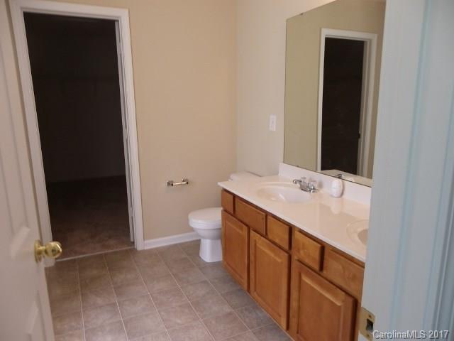 1124 Spicewood Pines Road Fort Mill, SC 29708 - Photo 7 of 16 a bathroom with a sink and a mirror