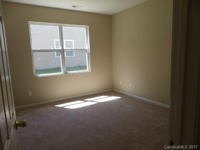 1124 Spicewood Pines Road Fort Mill, SC 29708 - Photo 10 of 16 a view of an empty room with a window