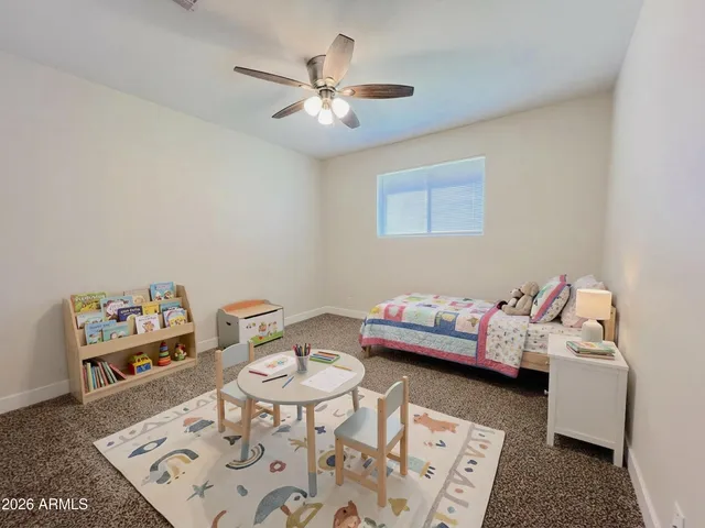 a view of a backyard of the house