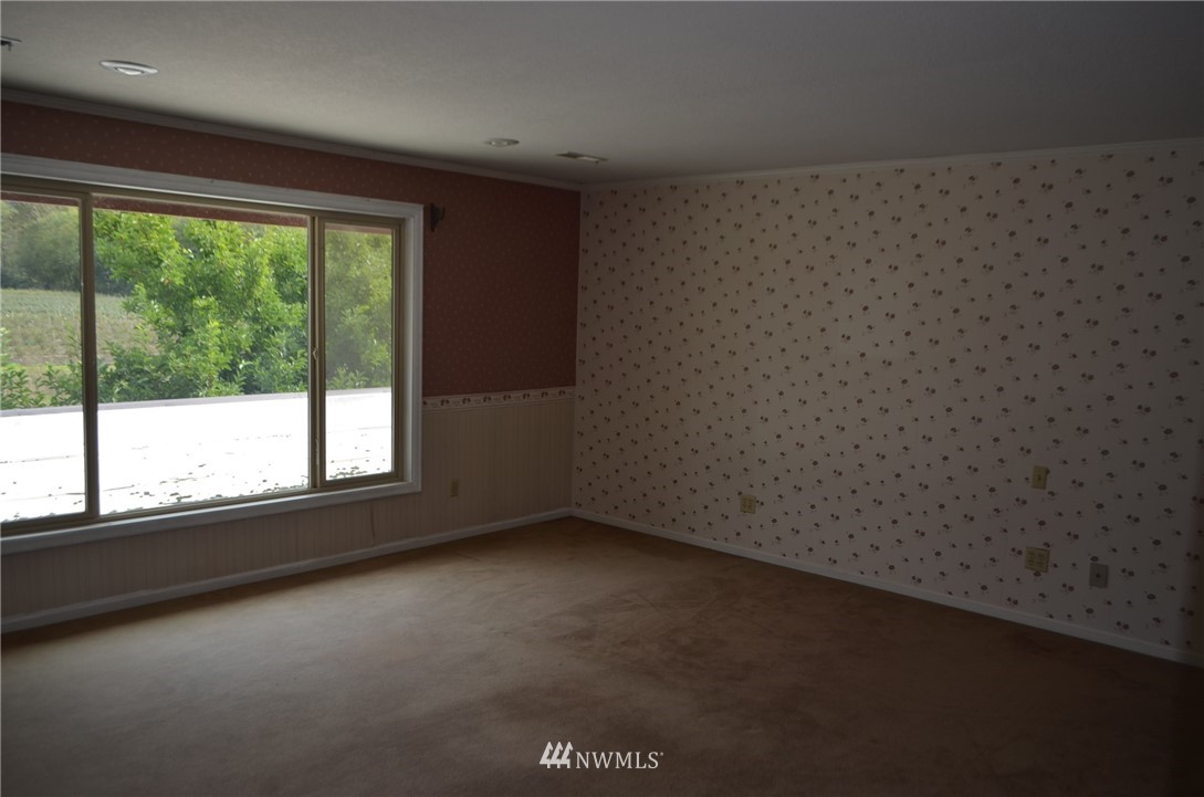 7878 Goodwin Road Everson, WA 98247 - Photo 8 of 16 an empty room with a window