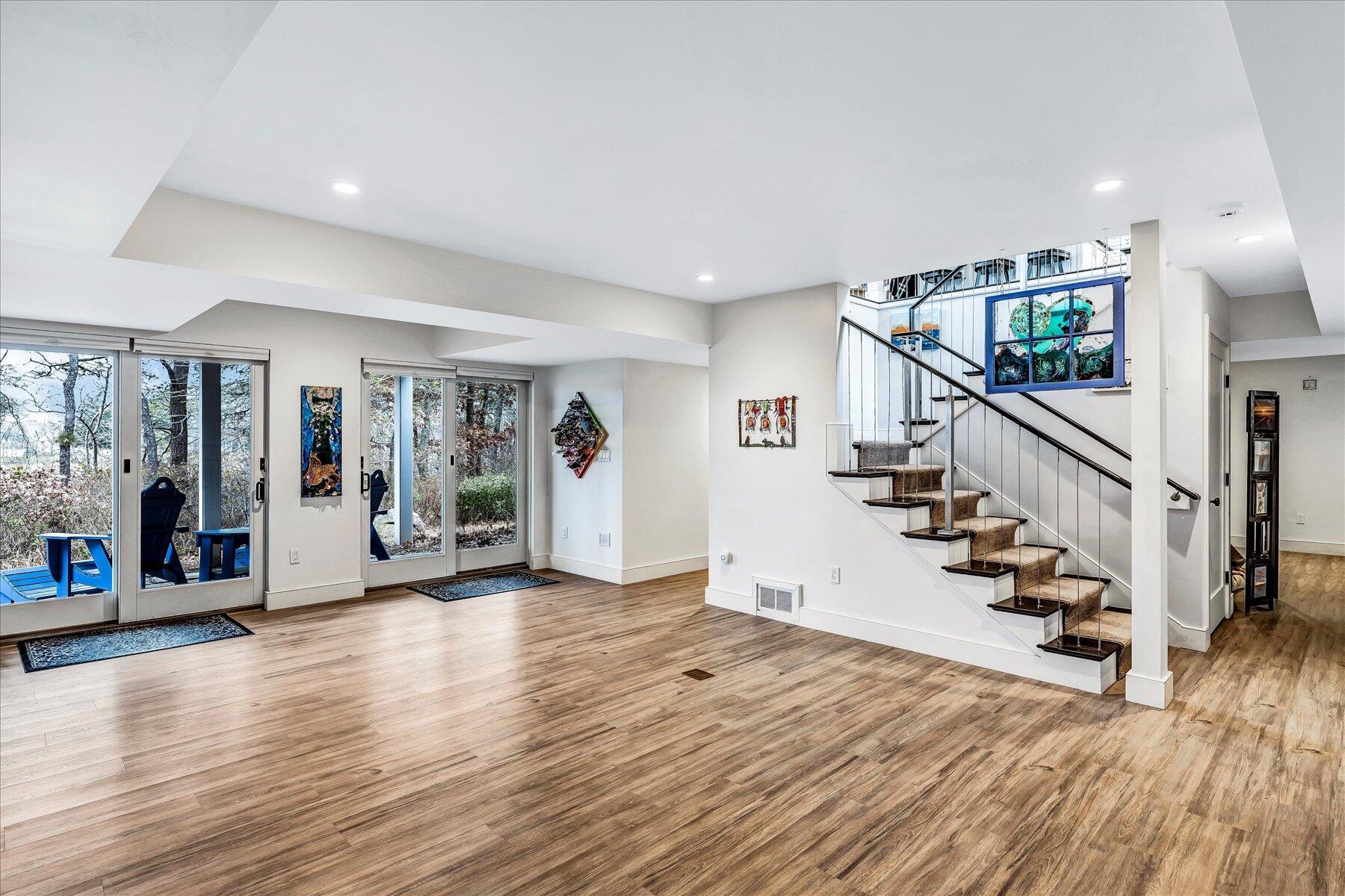 403 Great Oak Road Mashpee, MA 02649 - Photo 27 of 49 a view of an entryway with wooden floor and stairs