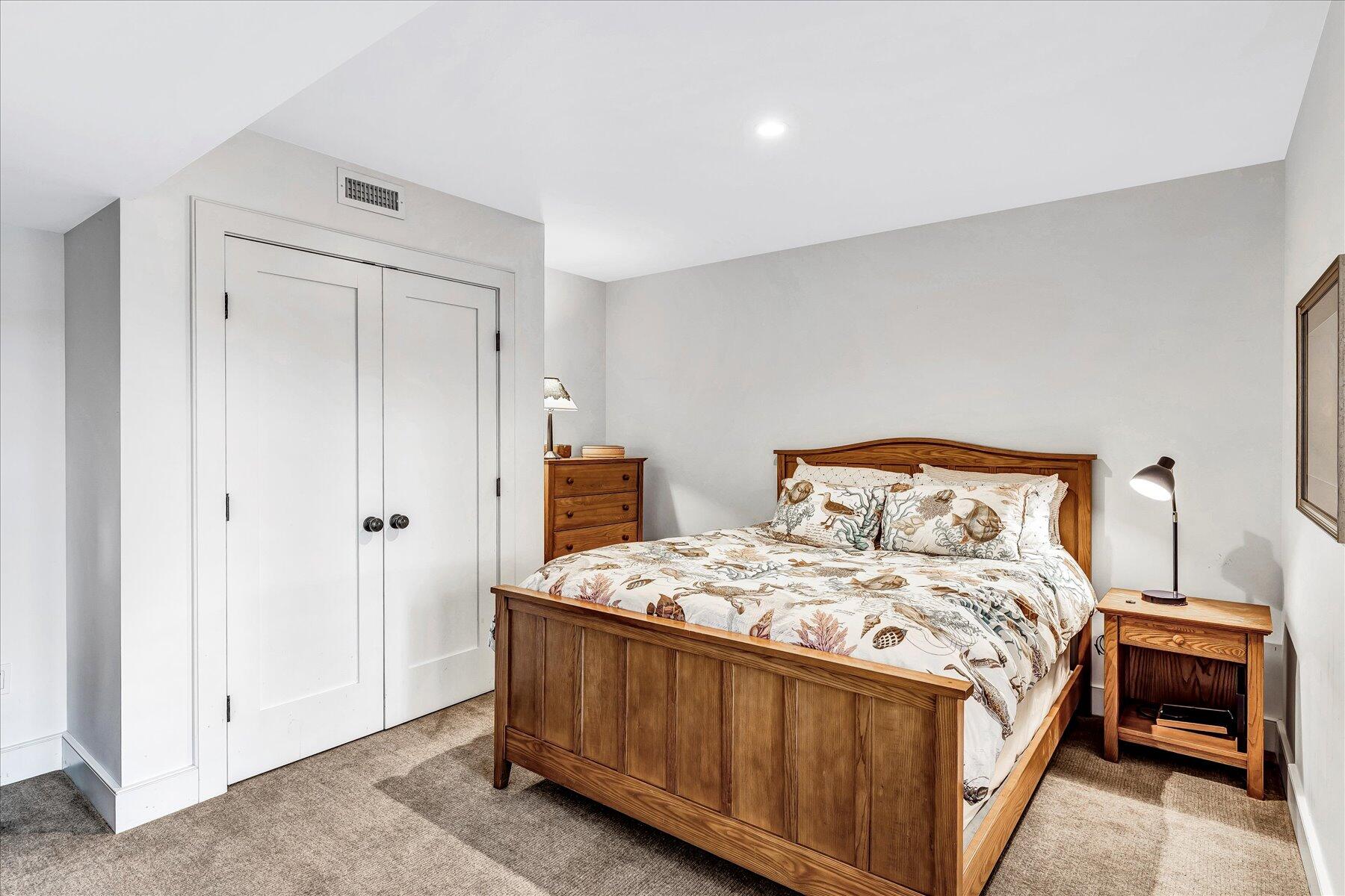 403 Great Oak Road Mashpee, MA 02649 - Photo 31 of 49 a bedroom with a bed and a window