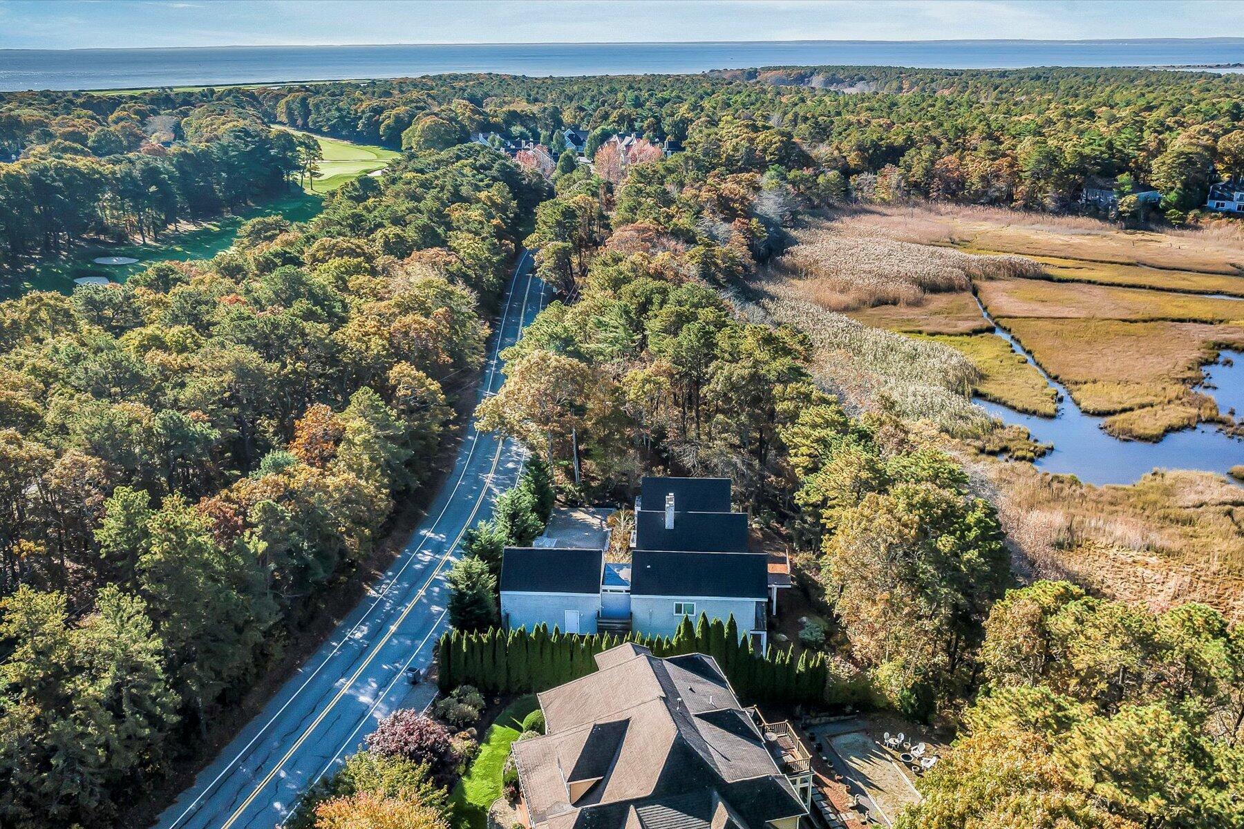 403 Great Oak Road Mashpee, MA 02649 - Photo 47 of 49 a view of a yard with plants