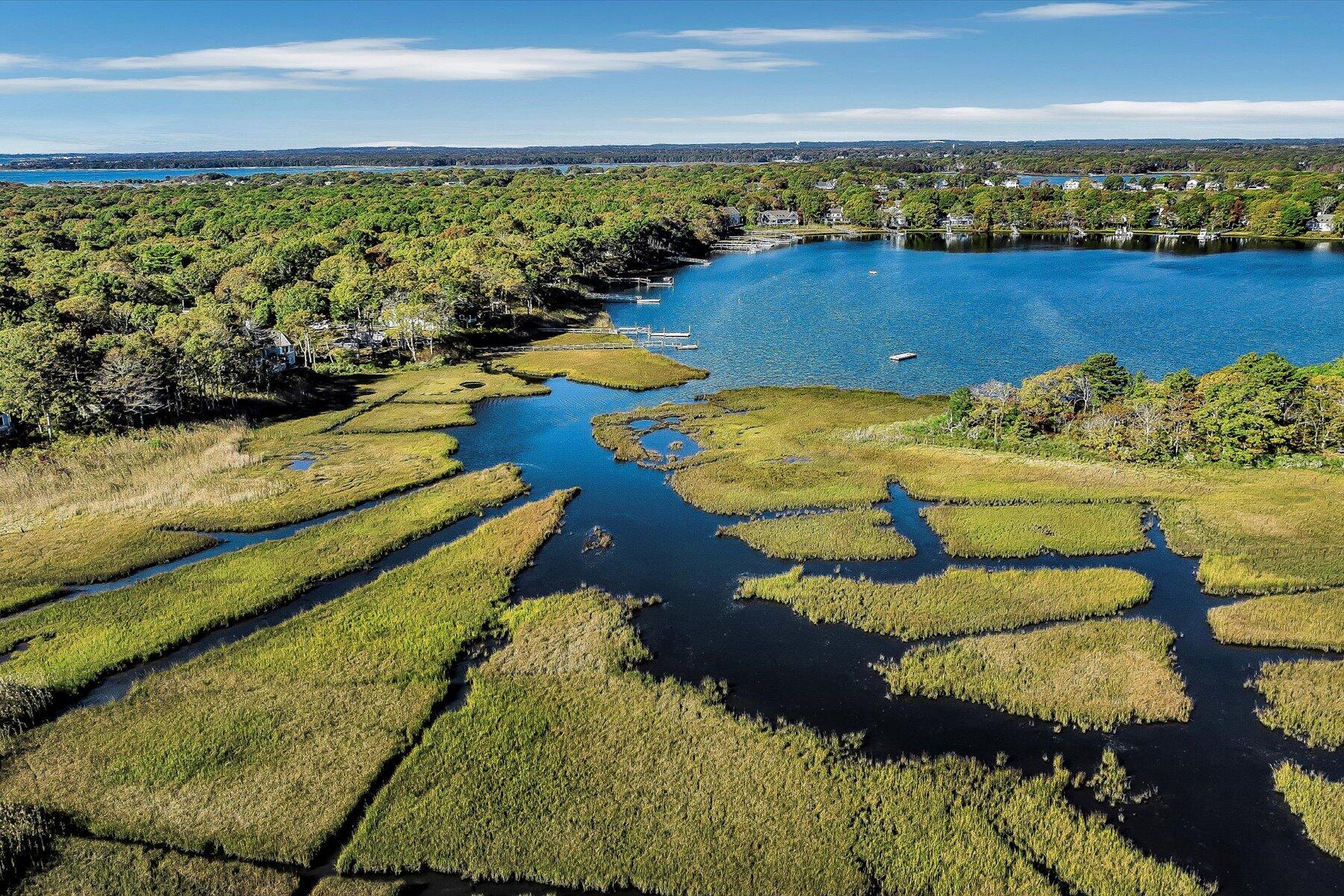 403 Great Oak Road Mashpee, MA 02649 - Photo 6 of 49 a view of a lake with a ocean view