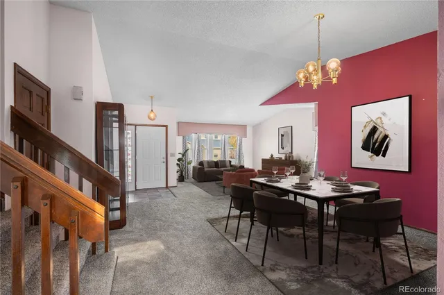 a living room with furniture windows and a fireplace