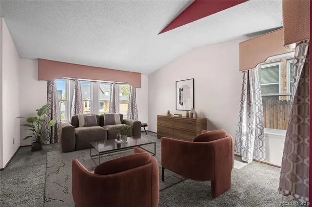 a kitchen with stainless steel appliances granite countertop a refrigerator a sink dishwasher and wooden cabinets with wooden floor