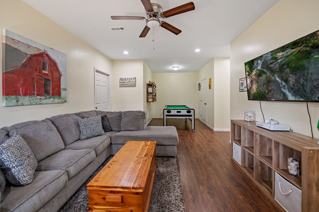 6 Gilliam Road Mineral Bluff, GA 30559 - Photo 23 of 42 a living room with furniture and a flat screen tv