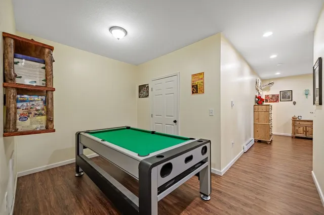 a room with furniture and a wooden floor