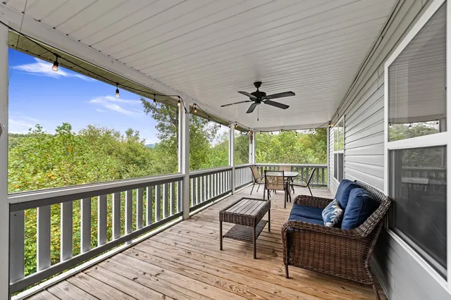 a view of balcony with furniture