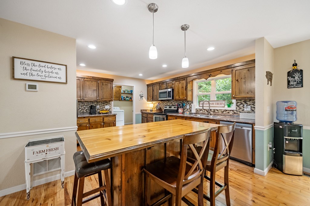 6 Gilliam Road Mineral Bluff, GA 30559 - Photo 7 of 42 a large kitchen with a table and chairs