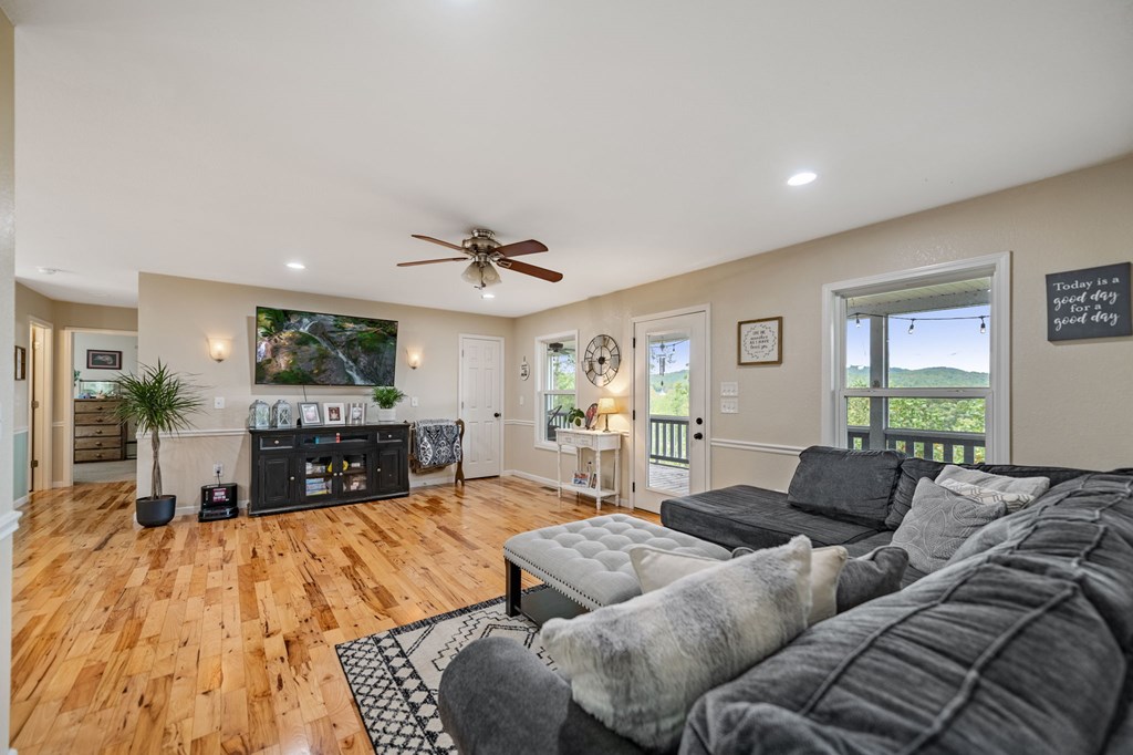 6 Gilliam Road Mineral Bluff, GA 30559 - Photo 8 of 42 a living room with furniture and a fireplace