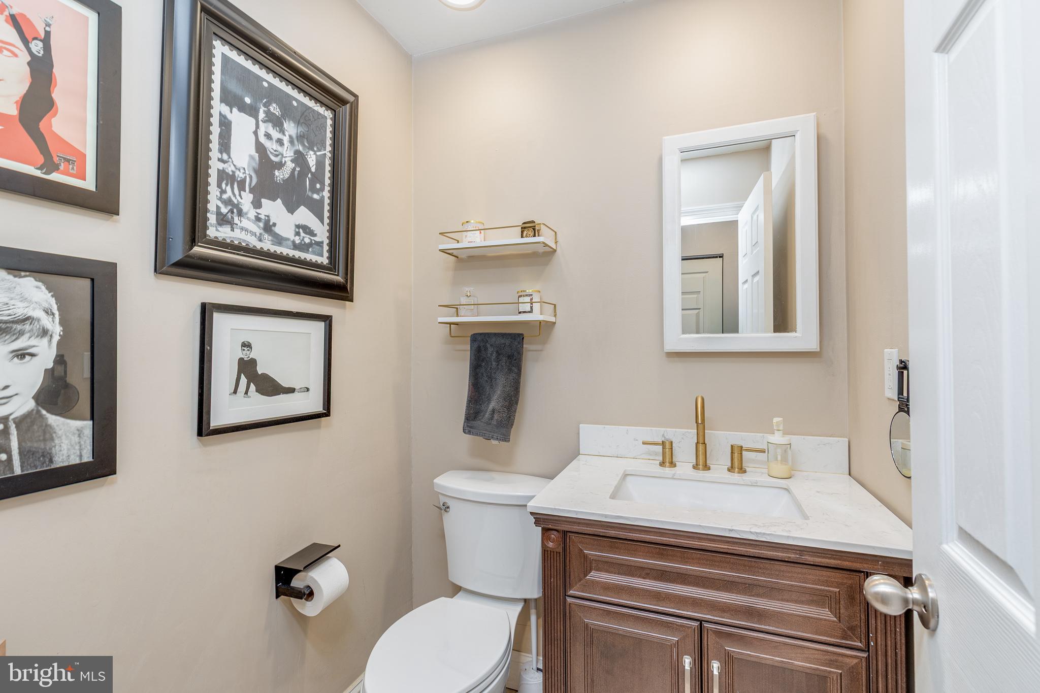 407 Indian Mills Road Shamong, NJ 08088 - Photo 19 of 39 a bathroom with a toilet a sink and mirror