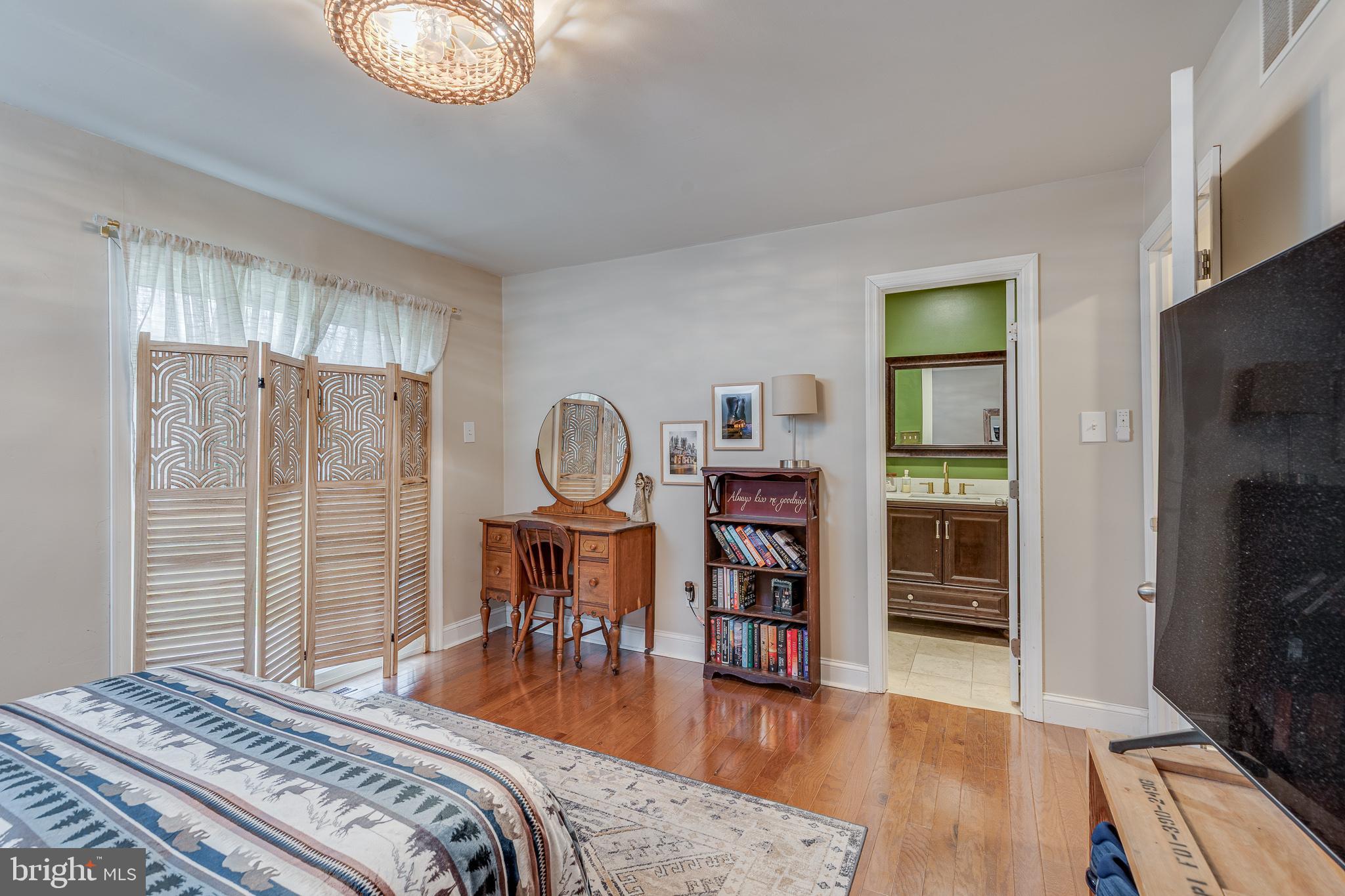 407 Indian Mills Road Shamong, NJ 08088 - Photo 22 of 39 a bedroom with furniture and a wooden floor