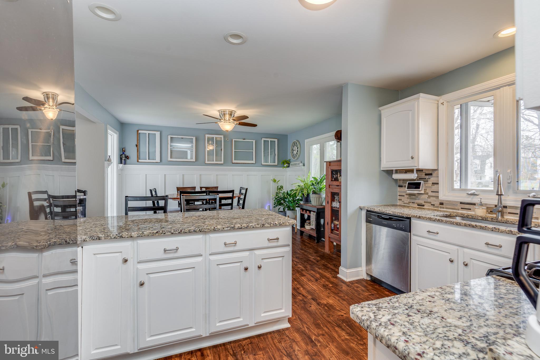407 Indian Mills Road Shamong, NJ 08088 - Photo 3 of 39 a kitchen with granite countertop a sink cabinets stainless steel appliances and a window