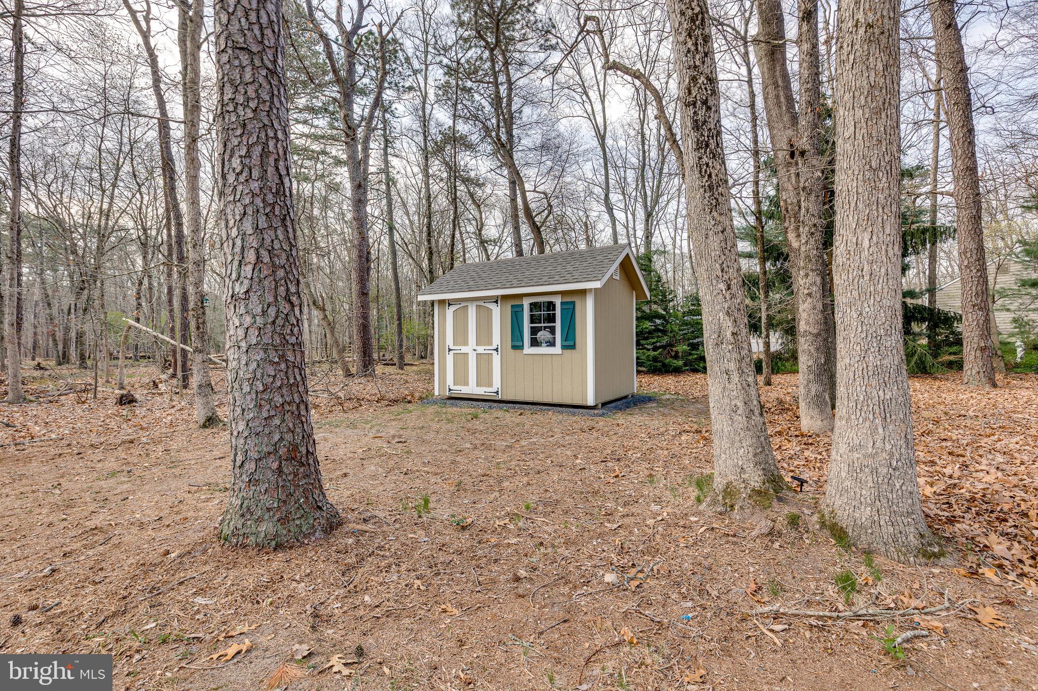 407 Indian Mills Road Shamong, NJ 08088 - Photo 37 of 39 a view of a house with a tree in the yard