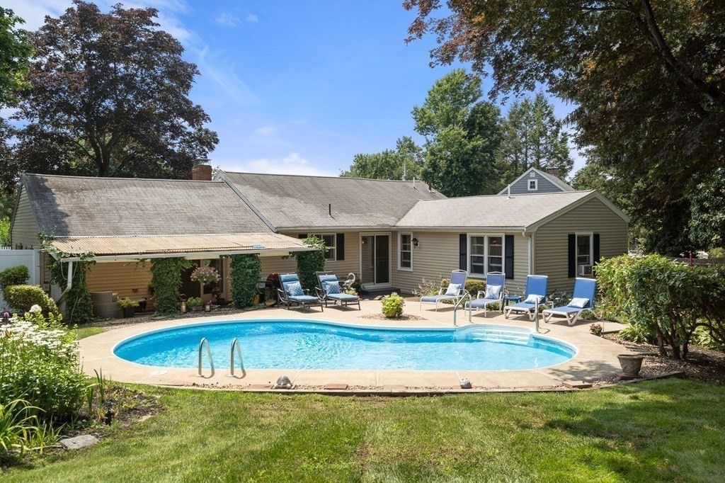 20 Sheffield Road Danvers, MA 01923 - Photo 1 of 38 a view of a house with swimming pool and sitting area
