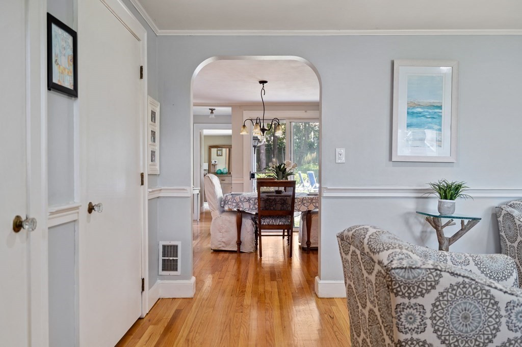 20 Sheffield Road Danvers, MA 01923 - Photo 12 of 38 a living room with furniture and a chandelier