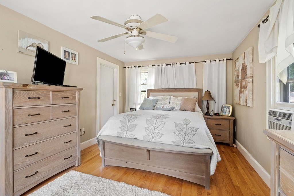 20 Sheffield Road Danvers, MA 01923 - Photo 18 of 38 a bedroom with a bed and flat screen tv