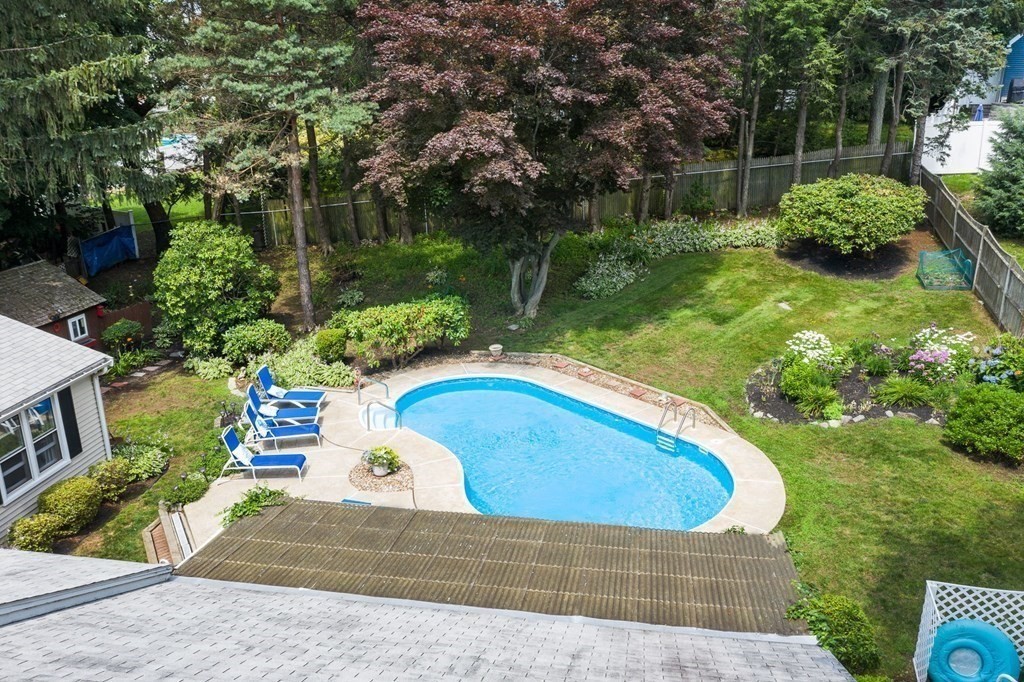 20 Sheffield Road Danvers, MA 01923 - Photo 2 of 38 a view of a swimming pool with a patio
