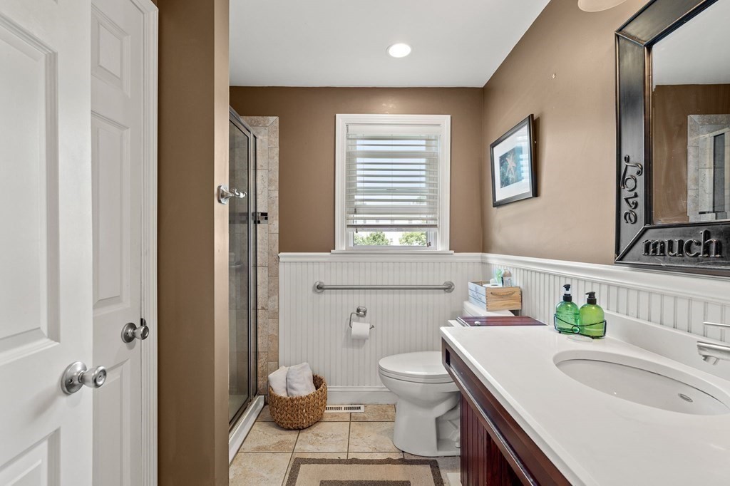 20 Sheffield Road Danvers, MA 01923 - Photo 22 of 38 a bathroom with a sink toilet and shower