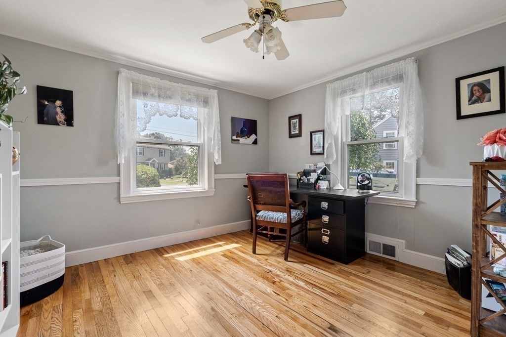 20 Sheffield Road Danvers, MA 01923 - Photo 23 of 38 a workspace with wooden floor and a window