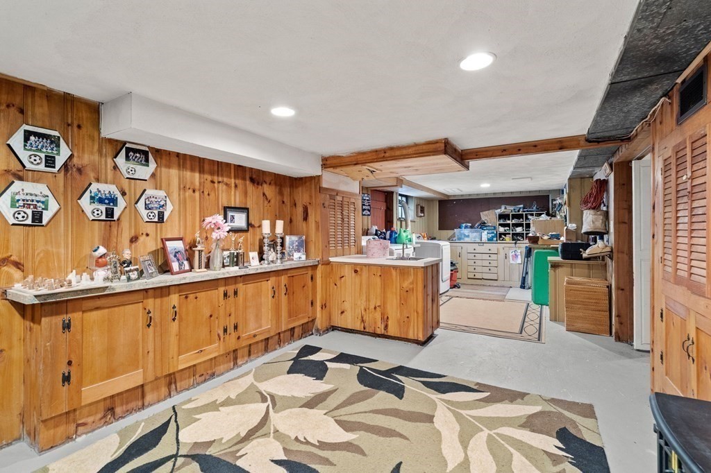 20 Sheffield Road Danvers, MA 01923 - Photo 27 of 38 a room with lots of wooden furniture and lots of wooden cabinets