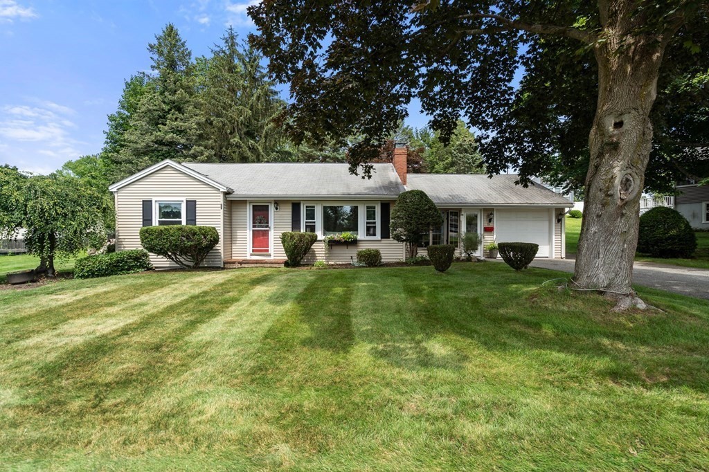 20 Sheffield Road Danvers, MA 01923 - Photo 3 of 38 a front view of a house with a yard