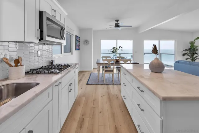 a large kitchen with cabinets