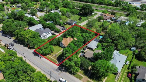 an aerial view of a city with lots of residential buildings