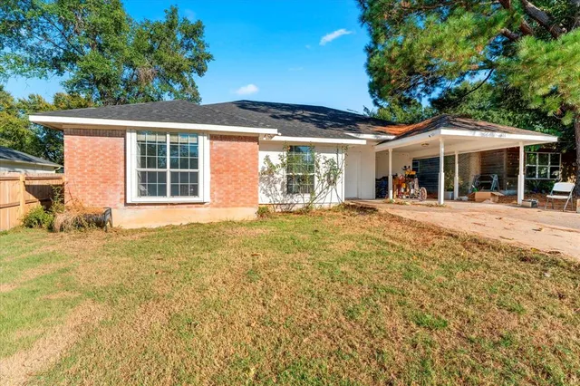 a front view of a house with a porch