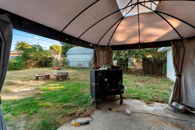 a view of a porch with a garden