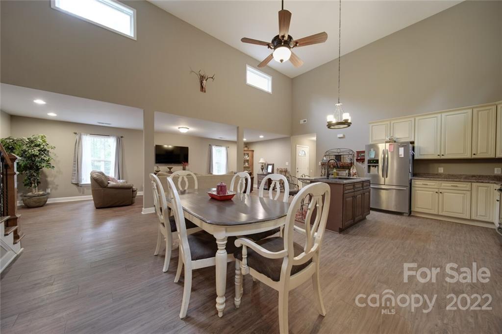 3579 Harmony Road Catawba, SC 29704 - Photo 15 of 48 a view of a dining room with furniture and a chandelier