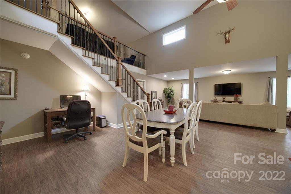 3579 Harmony Road Catawba, SC 29704 - Photo 16 of 48 a living room with furniture and a wooden floor
