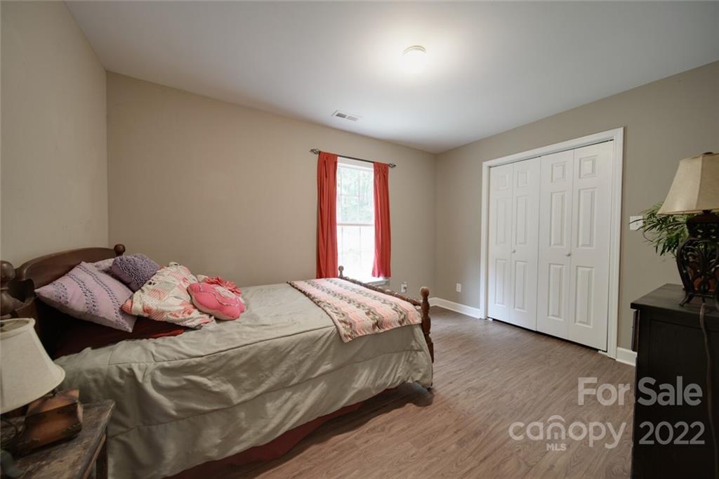 3579 Harmony Road Catawba, SC 29704 - Photo 29 of 48 a bedroom with a bed and a window