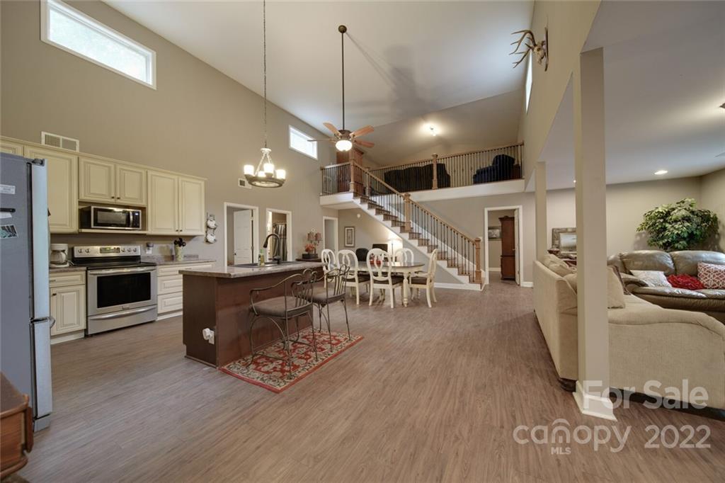 3579 Harmony Road Catawba, SC 29704 - Photo 3 of 48 a living room with furniture and kitchen view