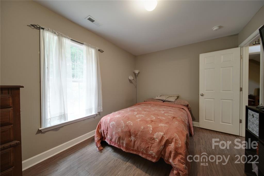 3579 Harmony Road Catawba, SC 29704 - Photo 34 of 48 a bedroom with a bed and a window