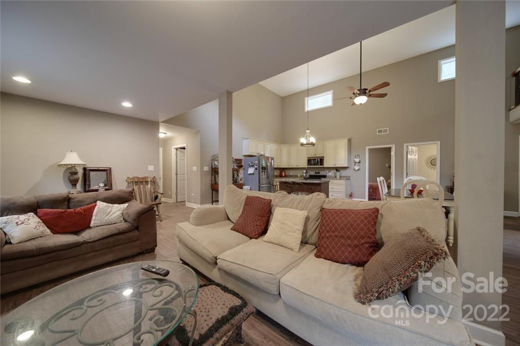 3579 Harmony Road Catawba, SC 29704 - Photo 4 of 48 a living room with furniture and a chandelier